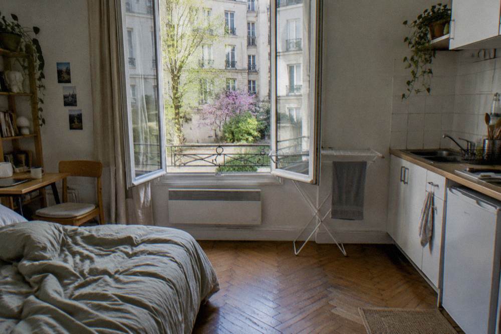 Small Paris studio apartment with kitchenette and window onto a courtyard